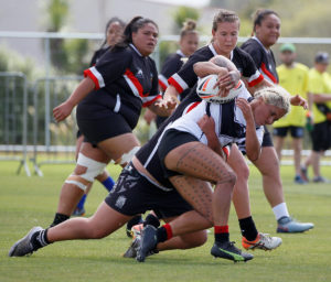 Canterbury, Warriors and Kiwi Ferns star Sui Pauaraisa is tackled during the women's trial at Ngā Puna Wai. Credit: Kevin Clarke - CMG Action Sports