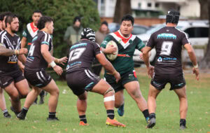 George F runs at the Honrby defensive line