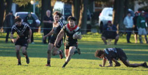 Julius Mumuta makes a break against the tired Panthers defence