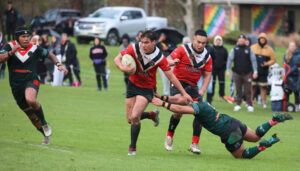 Joel Leka evades the Keas defence