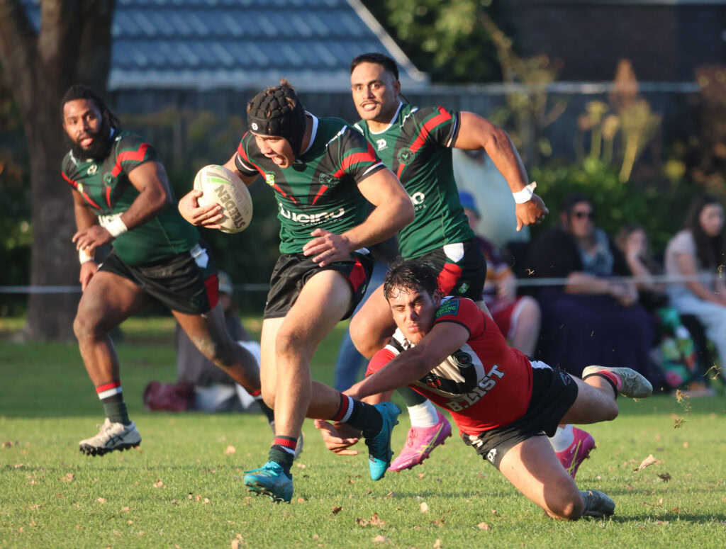 Joel Leka with the desperate dive to stop Thomas Irving