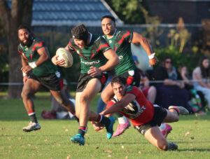 Joel Leka with the desperate dive to stop Thomas Irving