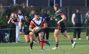 Matt Hollis picks up the loose ball to sprint to the tryline
